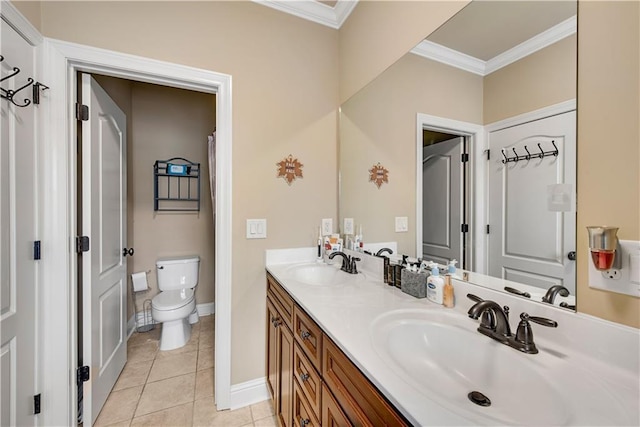 full bath featuring toilet, crown molding, a sink, and tile patterned floors