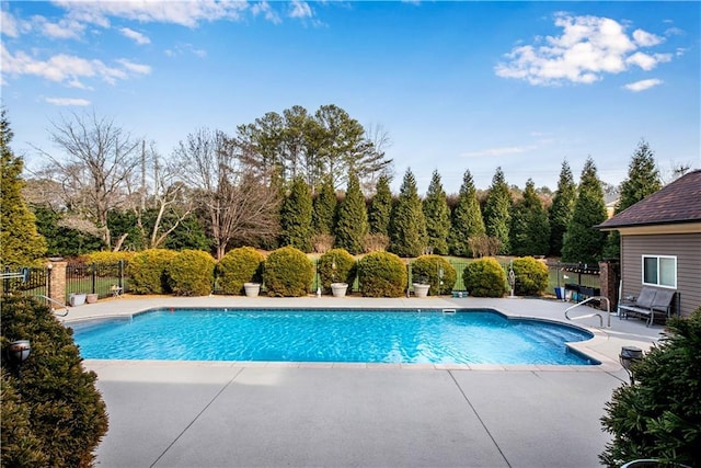 view of pool with a patio, fence, and a fenced in pool