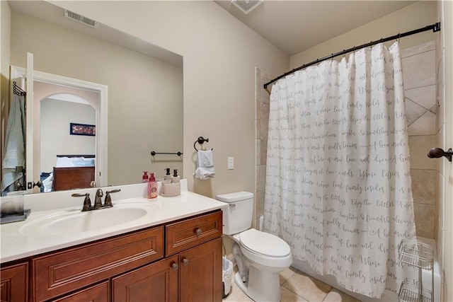 full bathroom with toilet, vanity, tile patterned flooring, and visible vents