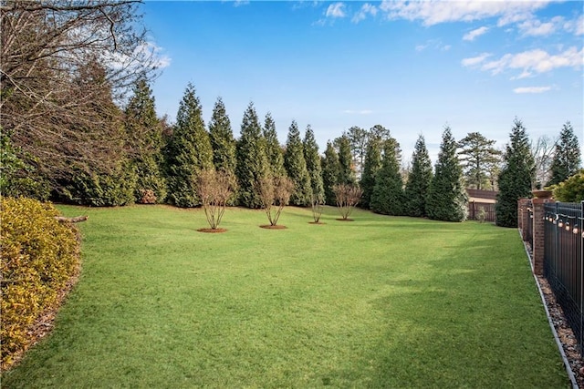 view of yard with fence