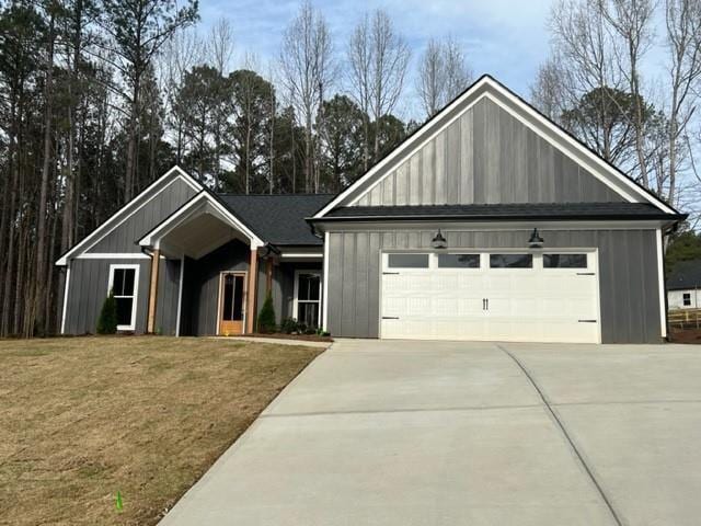 554 Presley Farm Pkwy, Rockmart, GA 30153 - view of front of home featuring an attached garage, concrete driveway, and a front yard