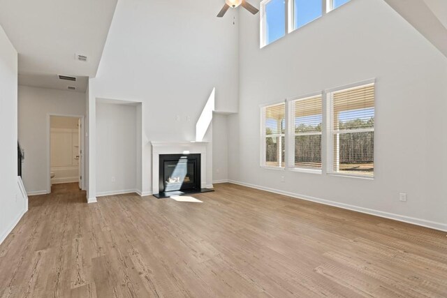 foyer with french doors, stairway, wood finished floors, and baseboards