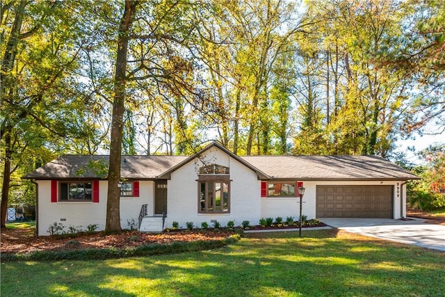 ranch-style house with a front lawn and a garage