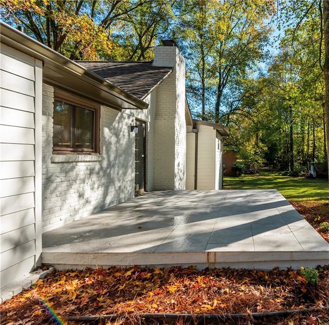 view of property exterior with a deck