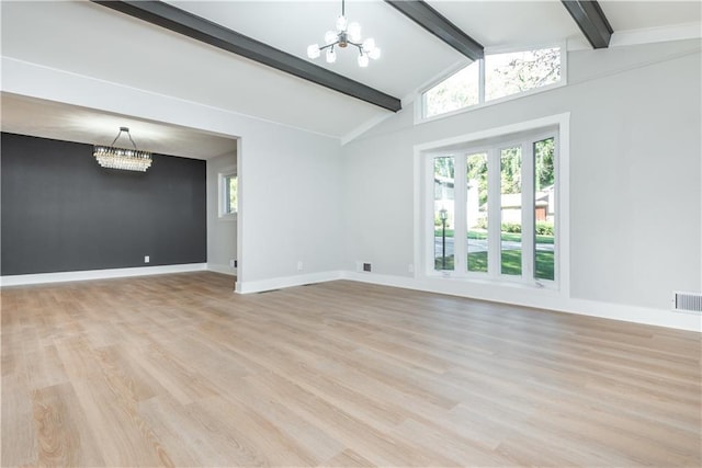 unfurnished living room with a chandelier, vaulted ceiling with beams, and light hardwood / wood-style flooring