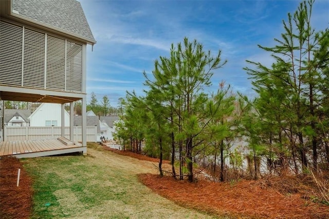 view of yard featuring a wooden deck
