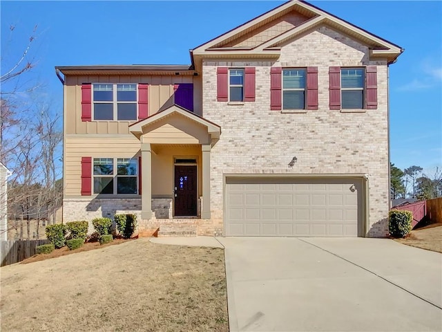 craftsman-style home with brick siding, concrete driveway, an attached garage, board and batten siding, and fence