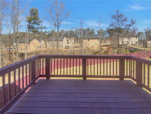 wooden deck with a residential view