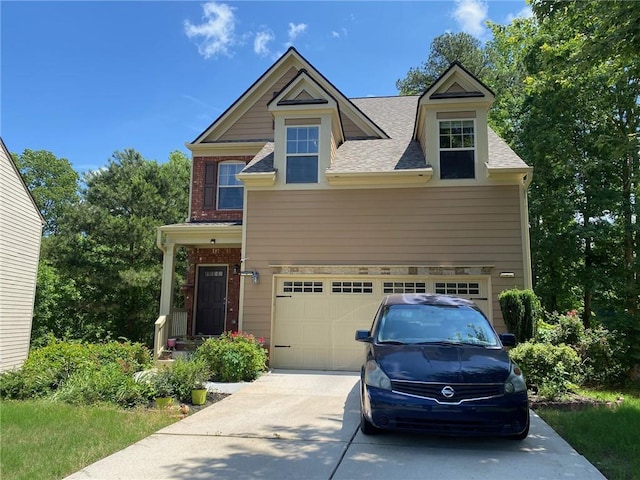 3692 Archgate Ct, Alpharetta, GA 30004 - view of front of home with concrete driveway, a garage, and roof with shingles