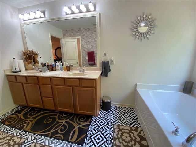 3692 Archgate Ct, Alpharetta, GA 30004 - bathroom with a garden tub, double vanity, and baseboards