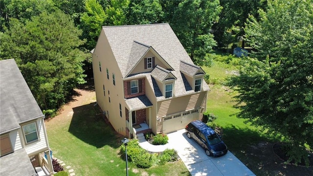 3692 Archgate Ct, Alpharetta, GA 30004 - view of front facade featuring concrete driveway, an attached garage, a front lawn, and roof with shingles