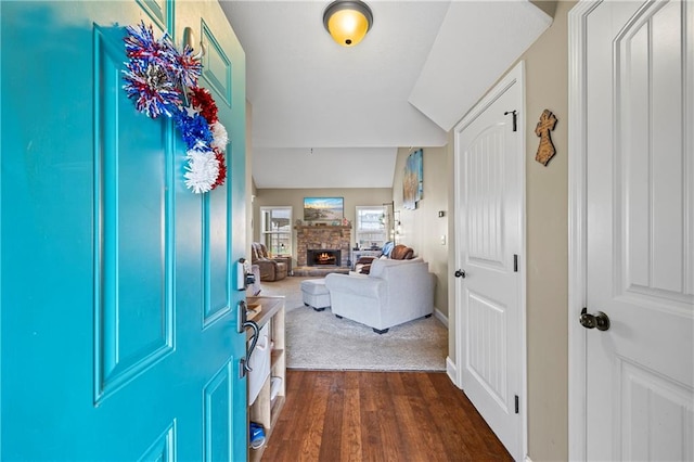 108 Lake Point Ct, Jefferson, GA 30549 - entryway with dark wood-style floors, a stone fireplace, and vaulted ceiling