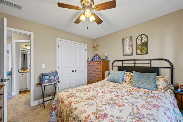 108 Lake Point Ct, Jefferson, GA 30549 - bedroom featuring light colored carpet, a closet, and ceiling fan
