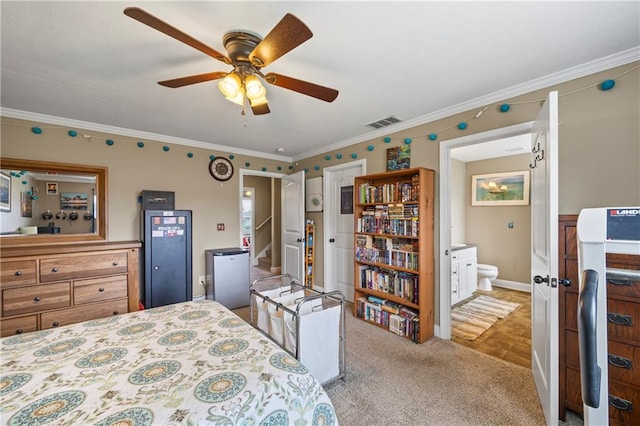 108 Lake Point Ct, Jefferson, GA 30549 - carpeted bedroom featuring ornamental molding, freestanding refrigerator, connected bathroom, and a ceiling fan