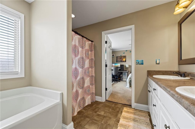 108 Lake Point Ct, Jefferson, GA 30549 - bathroom featuring healthy amount of natural light, double vanity, a garden tub, and curtained shower