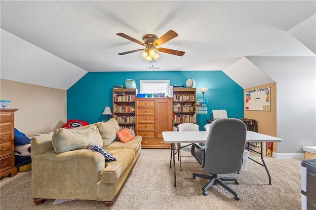 108 Lake Point Ct, Jefferson, GA 30549 - carpeted home office featuring vaulted ceiling, a ceiling fan, and a textured ceiling