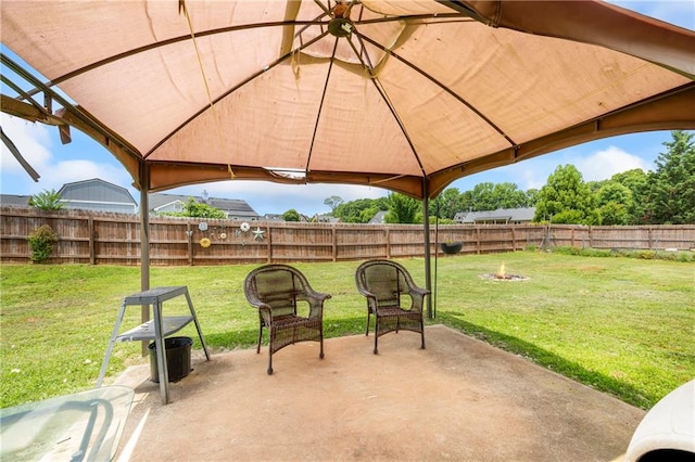 108 Lake Point Ct, Jefferson, GA 30549 - fenced backyard featuring an outdoor fire pit, a patio area, and a gazebo