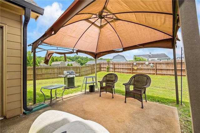 108 Lake Point Ct, Jefferson, GA 30549 - fenced backyard featuring a grill, a patio, and a gazebo