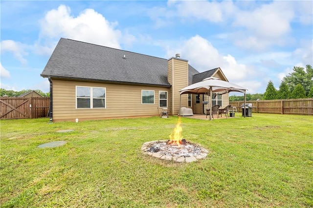 108 Lake Point Ct, Jefferson, GA 30549 - rear view of property with a gazebo, an outdoor fire pit, a patio area, and a fenced backyard