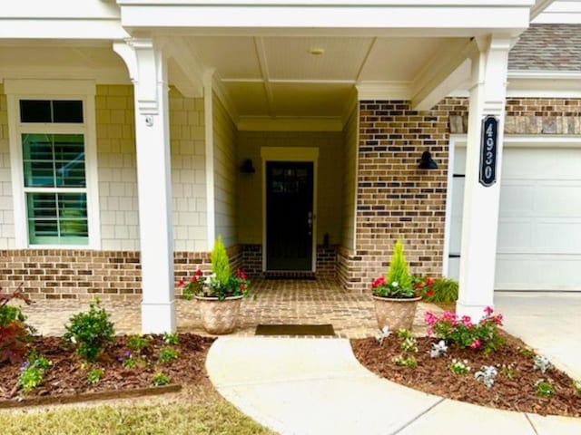 entrance to property featuring a garage