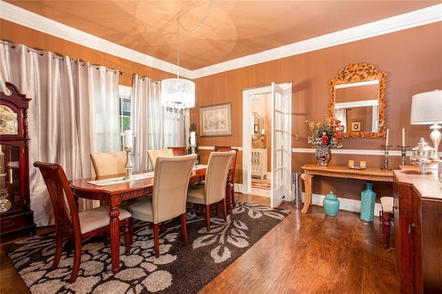 791 E Main St, Canton, GA 30114 - dining room with wood finished floors, a chandelier, crown molding, and baseboards