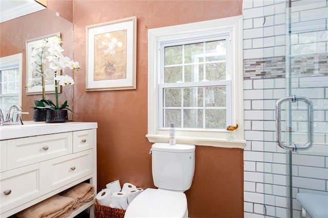 791 E Main St, Canton, GA 30114 - bathroom featuring vanity, toilet, a shower with shower door, and healthy amount of natural light