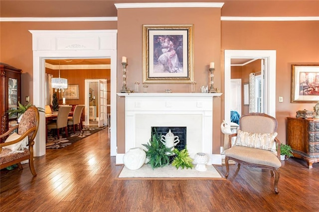 791 E Main St, Canton, GA 30114 - living room with crown molding, wood finished floors, and a fireplace with flush hearth