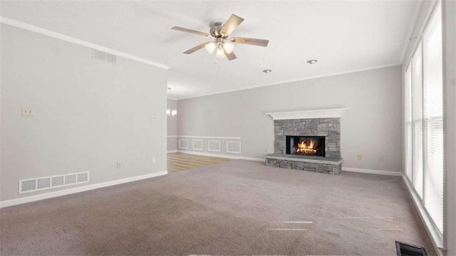 unfurnished living room featuring plenty of natural light and visible vents