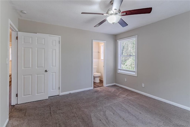 2329 Meadowlane Dr SW, Atlanta, GA 30311 - unfurnished bedroom with carpet flooring, a closet, ensuite bathroom, and ceiling fan