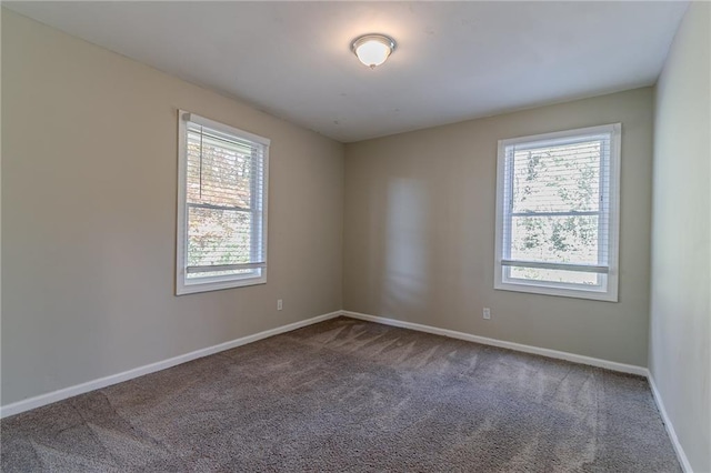 2329 Meadowlane Dr SW, Atlanta, GA 30311 - empty room featuring carpet flooring and a wealth of natural light