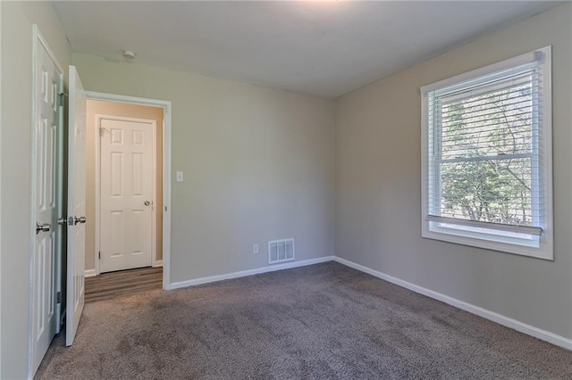 2329 Meadowlane Dr SW, Atlanta, GA 30311 - unfurnished room with dark colored carpet