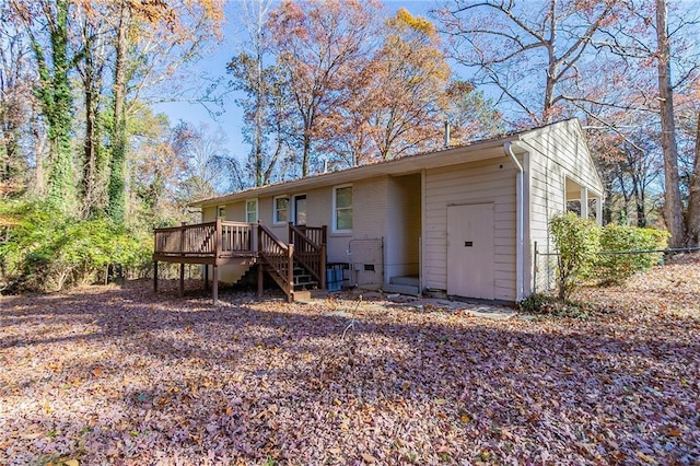 2329 Meadowlane Dr SW, Atlanta, GA 30311 - rear view of property with a wooden deck