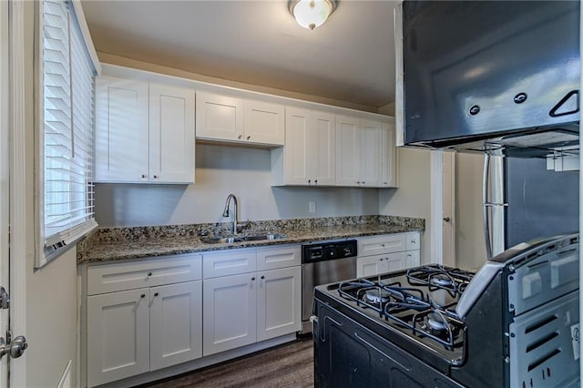 2329 Meadowlane Dr SW, Atlanta, GA 30311 - kitchen with sink, stone countertops, dark hardwood / wood-style flooring, white cabinetry, and stainless steel appliances