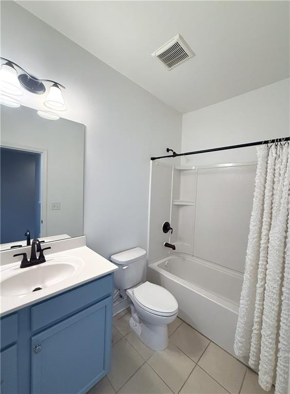 bathroom featuring toilet, shower / tub combo with curtain, visible vents, tile patterned floors, and vanity