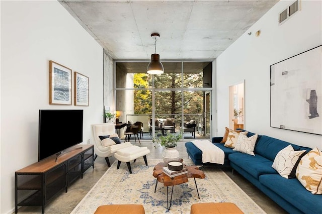 living room with floor to ceiling windows