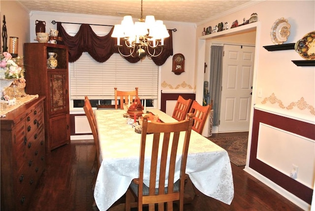 dining room with ornamental molding, a textured ceiling, a notable chandelier, and dark hardwood / wood-style flooring