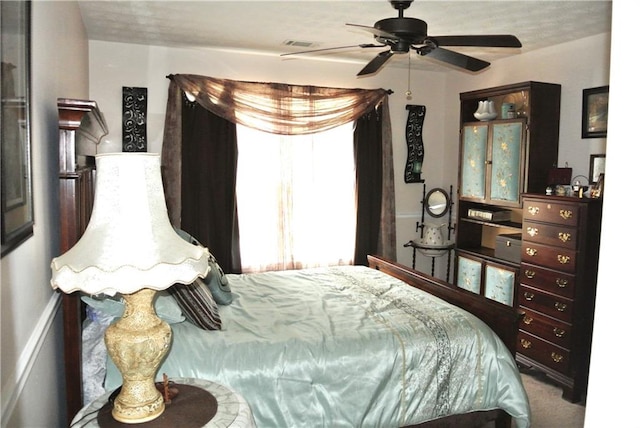 bedroom featuring ceiling fan