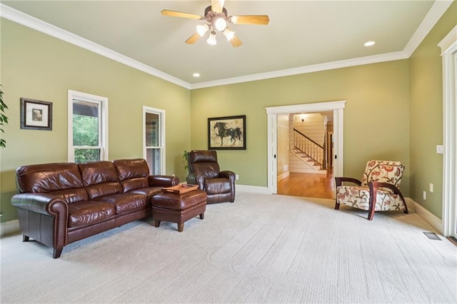 150 Henderson Farm Dr, Woodstock, GA 30188 - living area with light carpet, stairway, ornamental molding, a ceiling fan, and recessed lighting