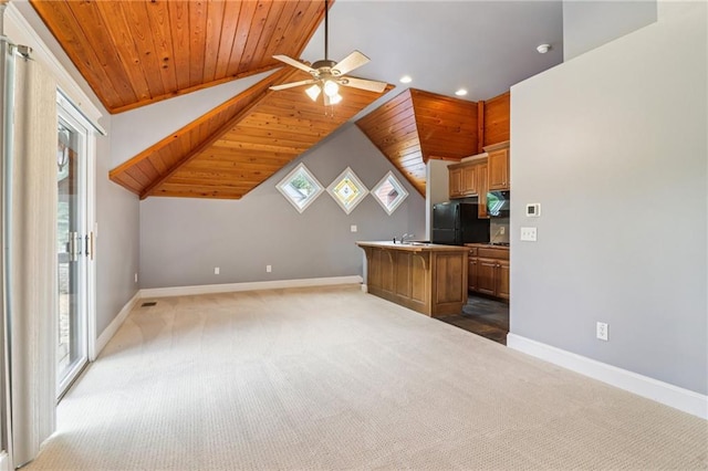150 Henderson Farm Dr, Woodstock, GA 30188 - kitchen featuring wood ceiling, freestanding refrigerator, light colored carpet, healthy amount of natural light, and lofted ceiling