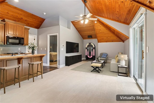 150 Henderson Farm Dr, Woodstock, GA 30188 - living area featuring carpet flooring, vaulted ceiling, ceiling fan, wooden ceiling, and recessed lighting