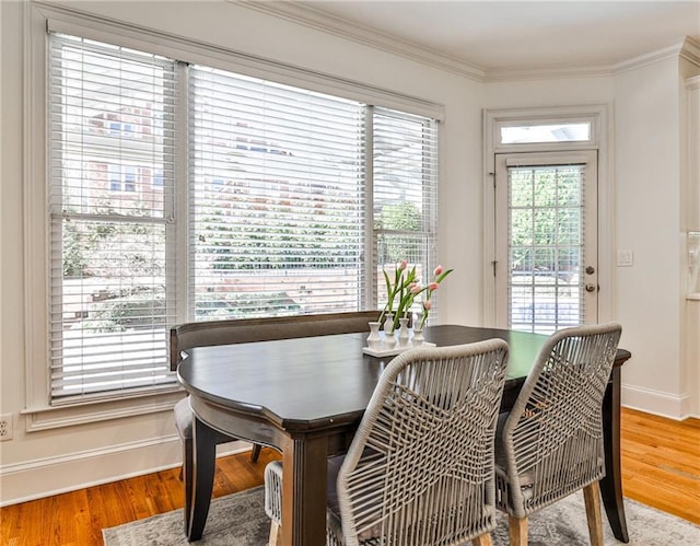 389 Mill Creek Bnd NE, Atlanta, GA 30307 - dining room with crown molding, baseboards, and wood finished floors