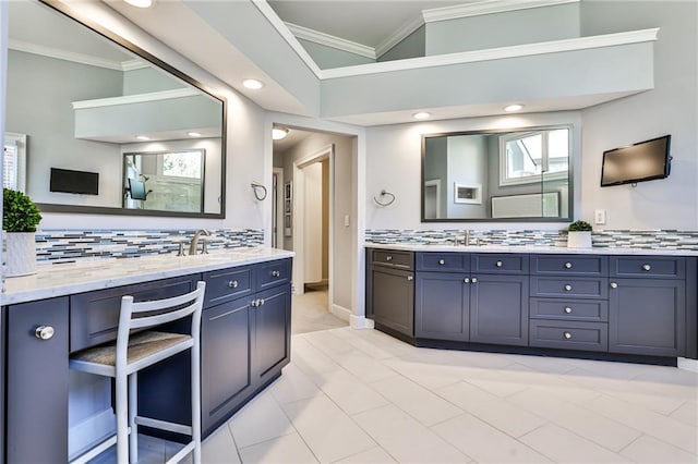 389 Mill Creek Bnd NE, Atlanta, GA 30307 - full bath featuring crown molding, decorative backsplash, two vanities, and recessed lighting