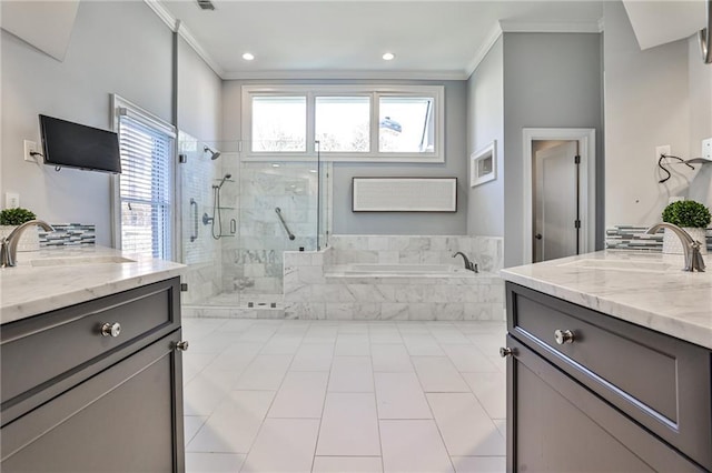 389 Mill Creek Bnd NE, Atlanta, GA 30307 - bathroom with crown molding, a sink, a stall shower, and a wealth of natural light