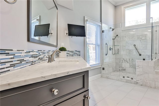 389 Mill Creek Bnd NE, Atlanta, GA 30307 - bathroom with tile patterned floors, plenty of natural light, backsplash, and a stall shower
