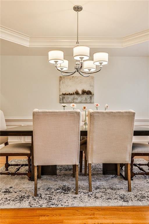 389 Mill Creek Bnd NE, Atlanta, GA 30307 - dining area featuring an inviting chandelier, ornamental molding, and wood finished floors