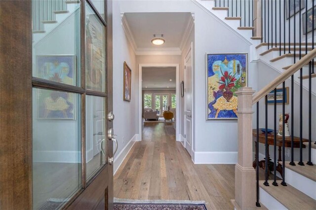 2010 Georgia Club Dr, Statham, GA 30666 - entryway with stairway, crown molding, and hardwood / wood-style floors