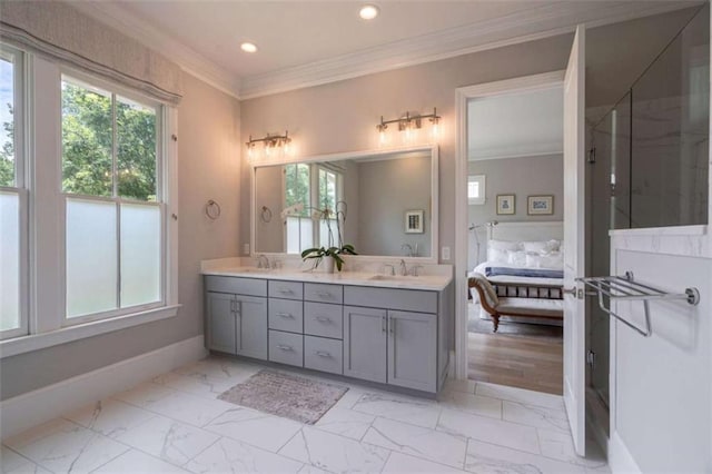 2010 Georgia Club Dr, Statham, GA 30666 - bathroom with plenty of natural light, double vanity, marble look tiles, crown molding, and connected bathroom