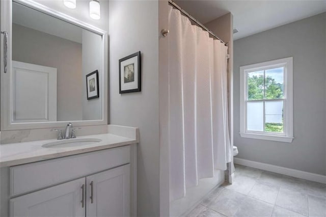 2010 Georgia Club Dr, Statham, GA 30666 - full bathroom with vanity, tile patterned flooring, and shower / bath combination with curtain