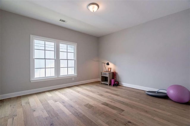 2010 Georgia Club Dr, Statham, GA 30666 - unfurnished room featuring wood finished floors and baseboards