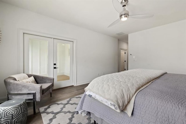 bedroom with ceiling fan and wood-type flooring